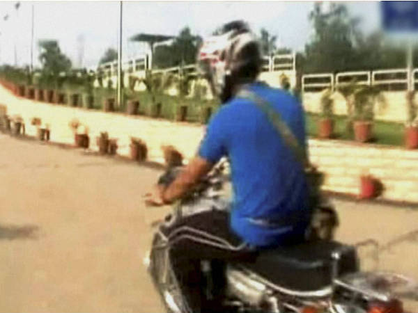 Mahendra Singh Dhoni on bike