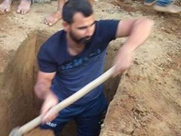 कब्र खोदते नजर आए...