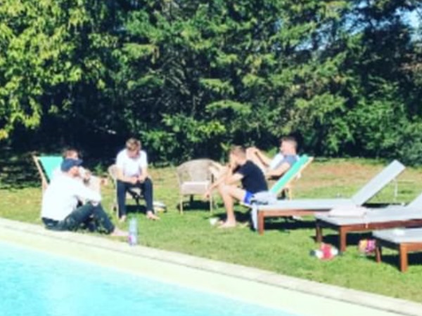 England cricket star Ben Stokes is pictured at teammate's wedding smoking and with bandaged hand