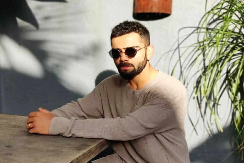 जब घुटनों पर झुककर अपने क्यूट फैन से बात करने लगे विराट, तस्वीर हुई वायरल