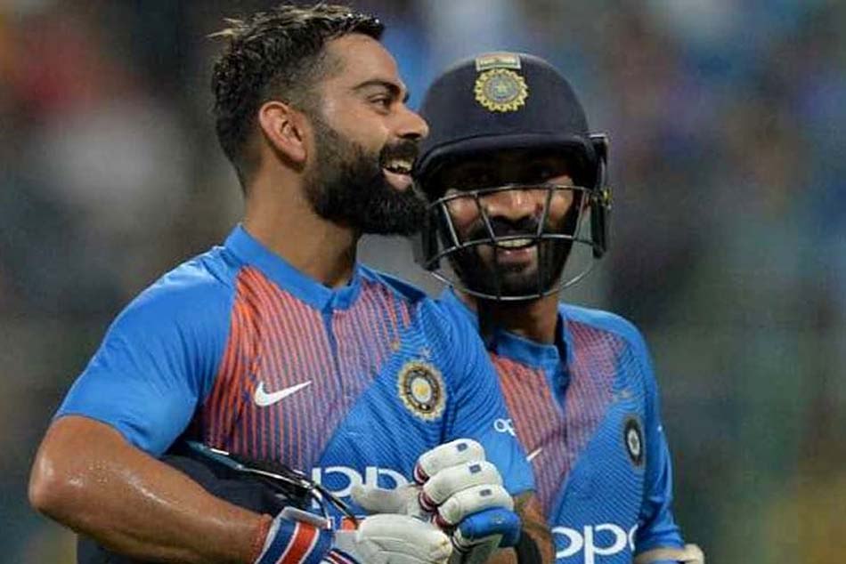 Dinesh Karthik with Kohli 